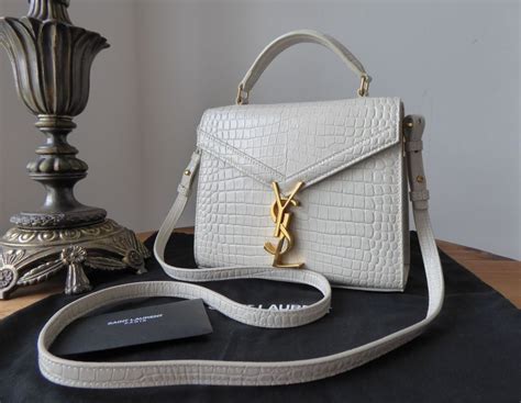 ysl mini cassandra white|ysl cassandre pouch.